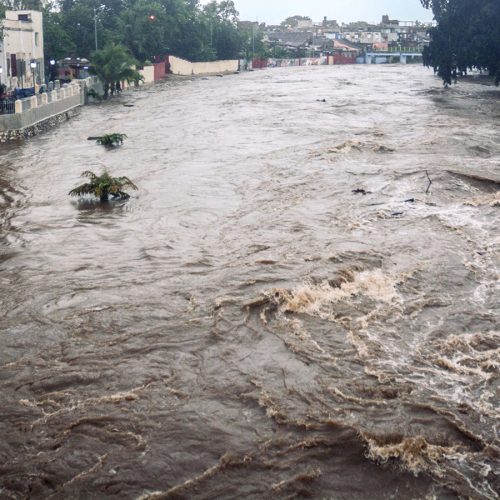 This handout picture released by the Cuban News Agency shows a river overflowing its banks due to heavy rains associated with subtropical storm Alberto, on May 28, 2018, Sancti Spiritus province. (Photo by STR / ACN / AFP)        (Photo credit should read STR/AFP/Getty Images)